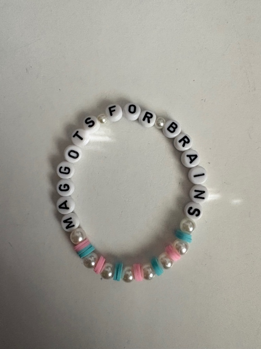 Olivia Rodrigo “maggots for brains” bracelet